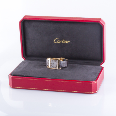 Швейцарские часы Cartier  
Santos-Dumont