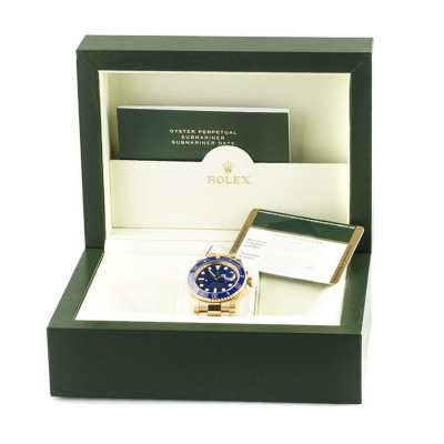 Швейцарские часы Rolex  
Submariner Blue Dial 
18kt Yellow Gold 40 mm