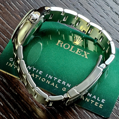Швейцарские часы Rolex Oyster Perpetual Green Dial 31mm